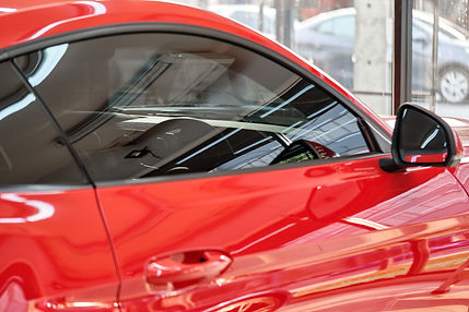 Close up of car Tintman Plus window tint. Ceramic film provide heat rejection & UV protection with colo
