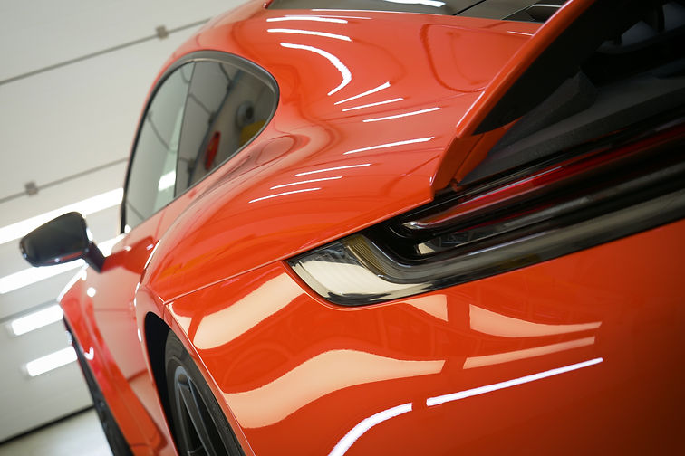 Close up photo of open rear trunk spoiler, black privacy windows and chrome ornaments..jpg