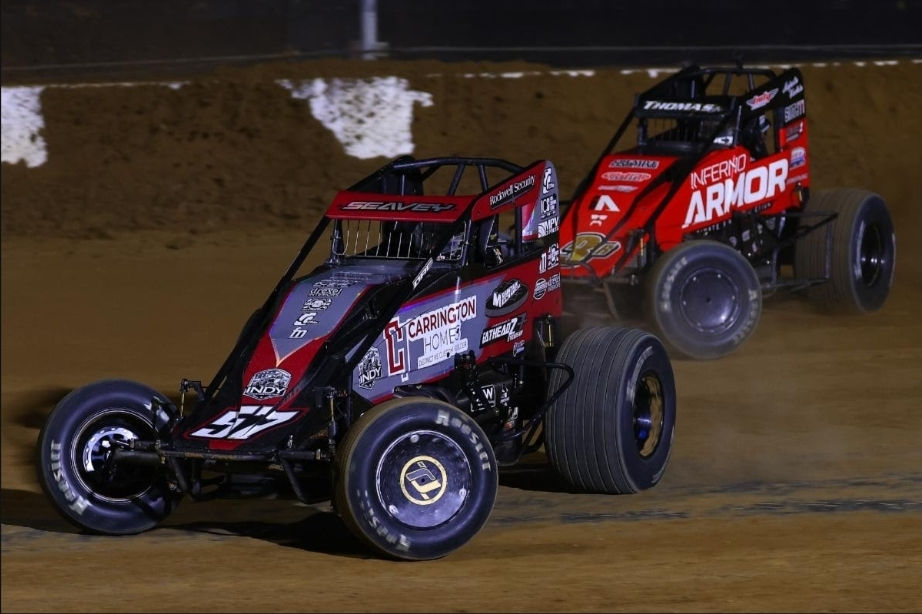 The 2025 USAC Indiana Sprint Week will kick off with a special invitational at The Dirt Track at IMS. Pictured: Former Indiana Sprint Week champions Logan Seavey and Kevin Thomas Jr. Photo courtesy: USAC Media - Photographer: Josh James Artwork Photo