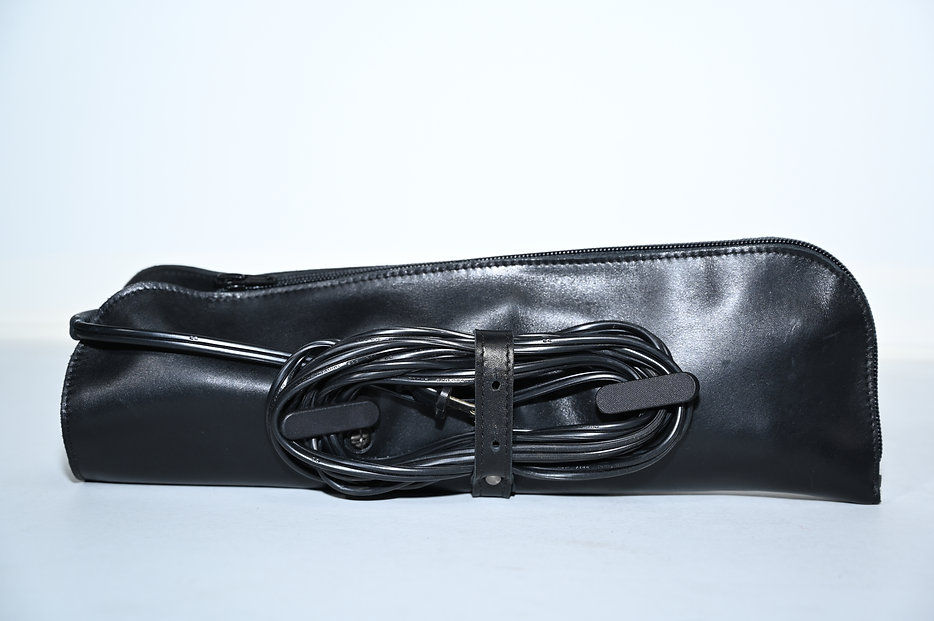 Thumbnail: The One Pocket HTC sleeve with in use with a tool inside and the cords neatly wrapped around cord holders