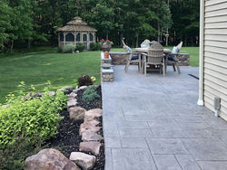 Stamped Concrete Patio and Sitting Wall | Gruttadaurio Masonry | Rochester, NY