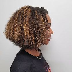 conditioning her hair to add moisture an