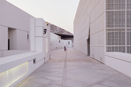 Modern white architecture with a patterned dome roof