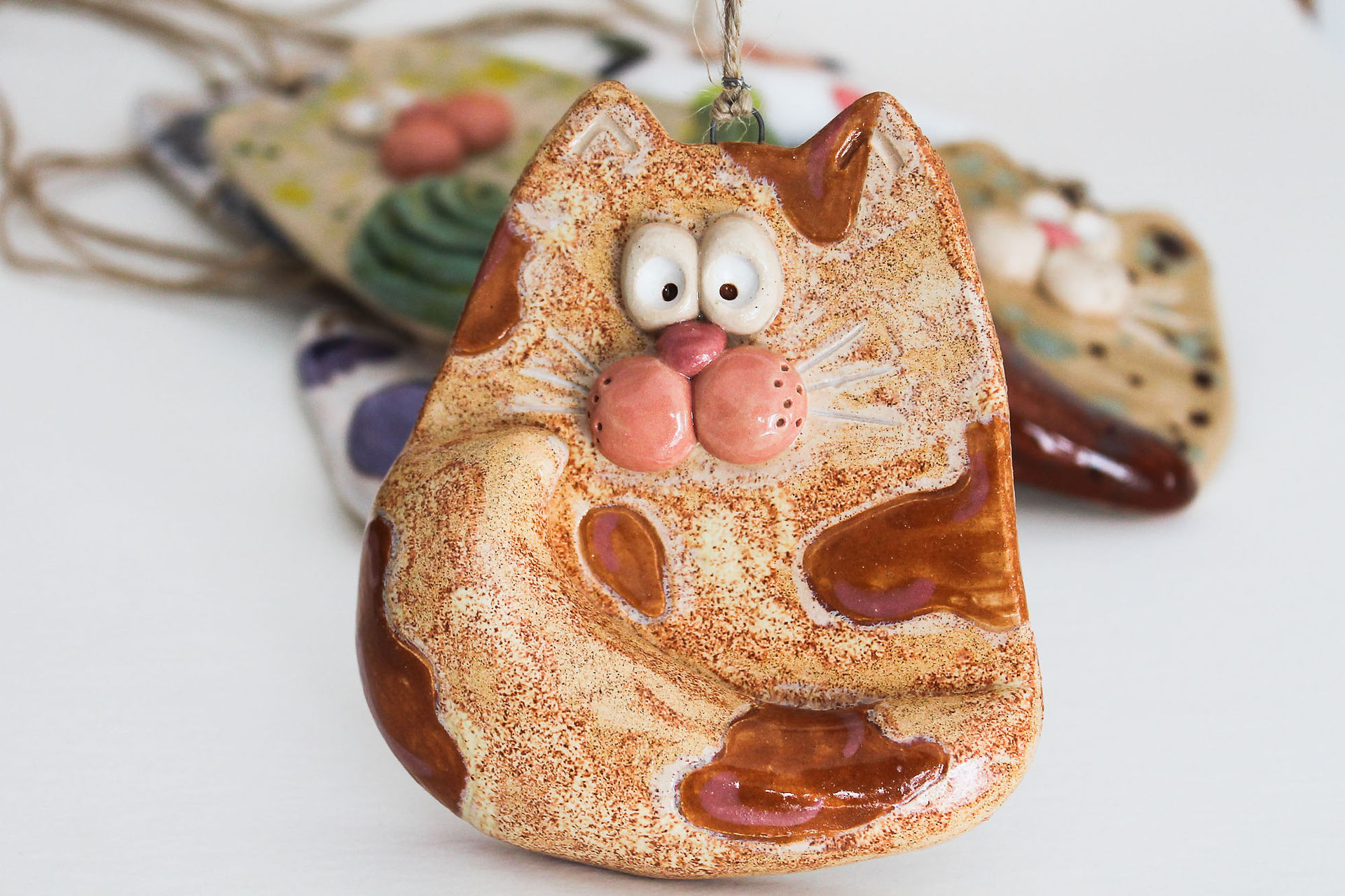 Charming ceramic cat for wall decoration