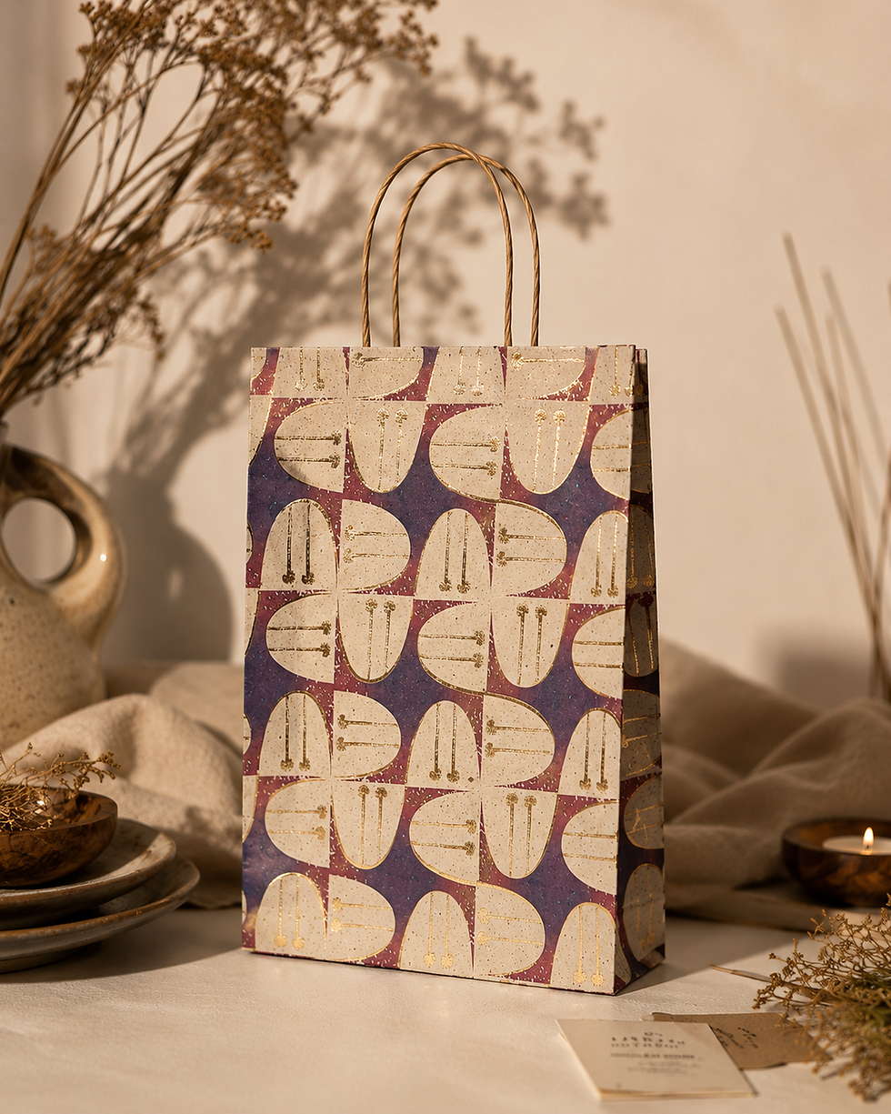 Patterned gift bag with purple and beige geometric shapes