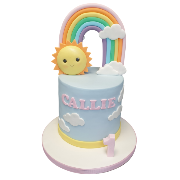 A vibrant rainbow cake featuring colourful layers and a cute design, perfect for special occasions and celebrations.