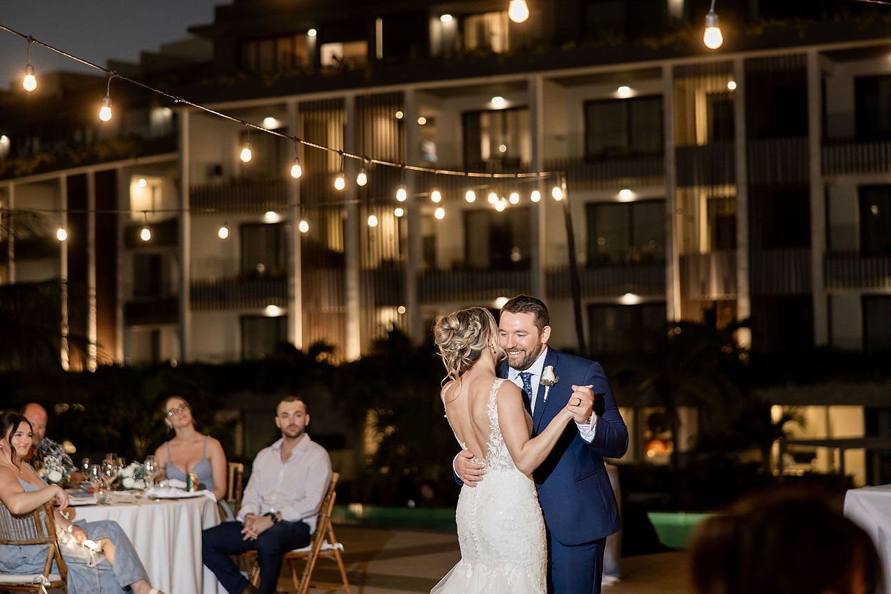 Bride and groom's first dance at their destination wedding at Majestic Elegance Costa Mujeres in Mexico.