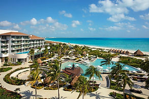 Aerial photo of Main Pool at Dreams Playa Mujeres wedding resort in Mexico.
