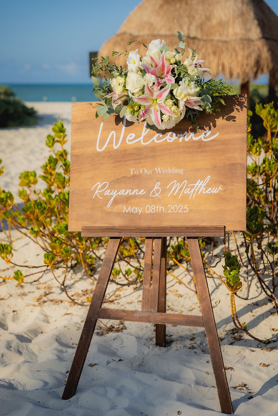 Wooden destination wedding welcome sign.