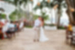 Bride and groom kissing at their oceanfront reception at Las Palmas Terrace at the Hyatt Ziva Puerto Vallarta wedding resort in Mexico. 