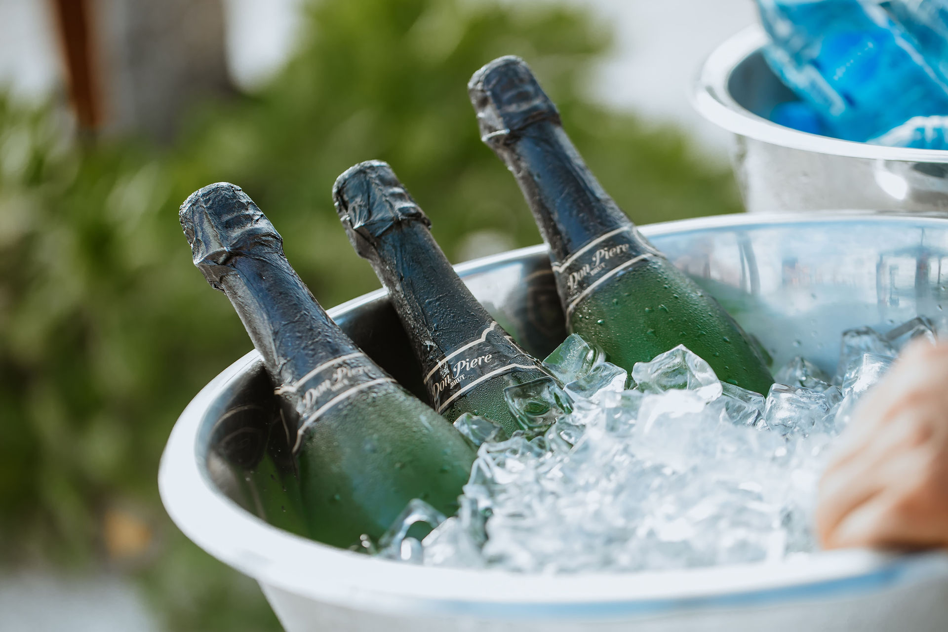 Champagne on ice at all inclusive wedding at Secrets Akumal in Mexico planned by travel agent for destination weddings, EverAfter Travel.