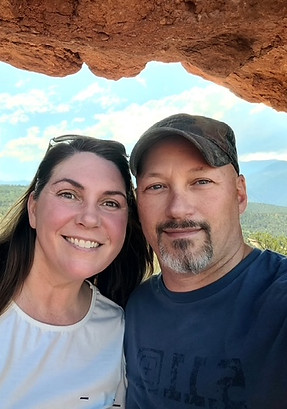 Engagement photo of couple at the Garden of the Gods who are planning their destination wedding at Valentin Imperial Riviera Maya in Mexico.