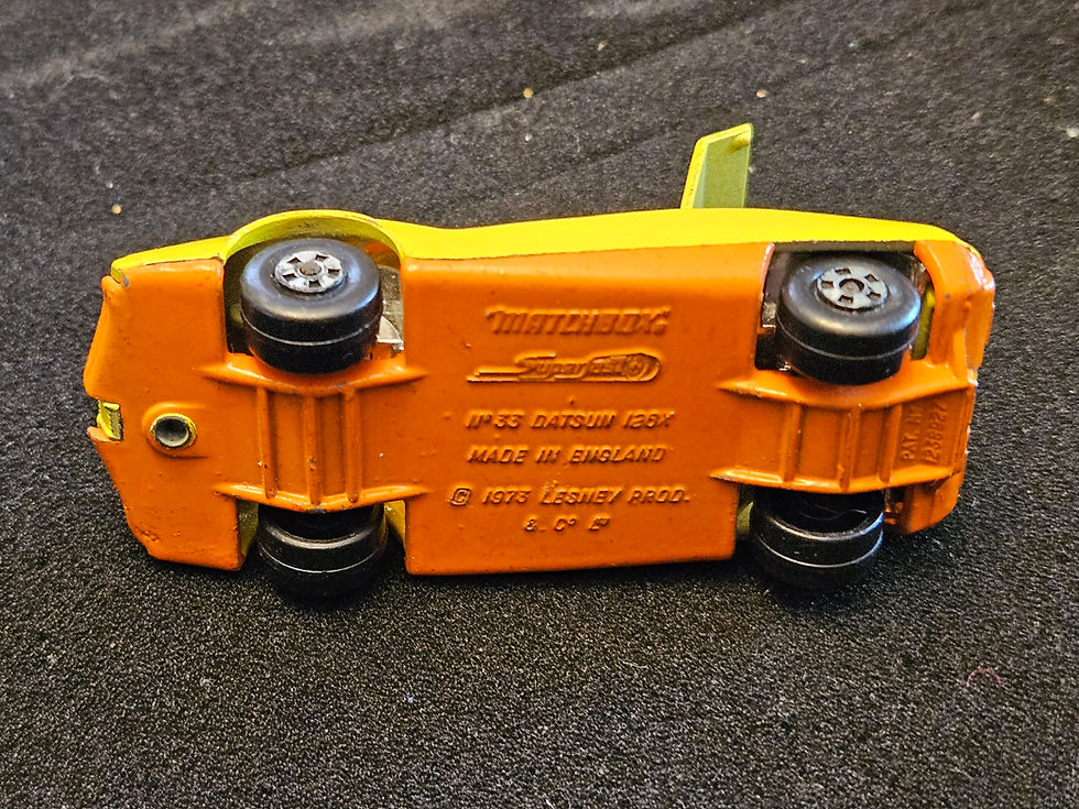 Thumbnail: 1974 Matchbox Superfast Datsun 128X No. 33 Yellow / Orange Opening Hatch 1/64