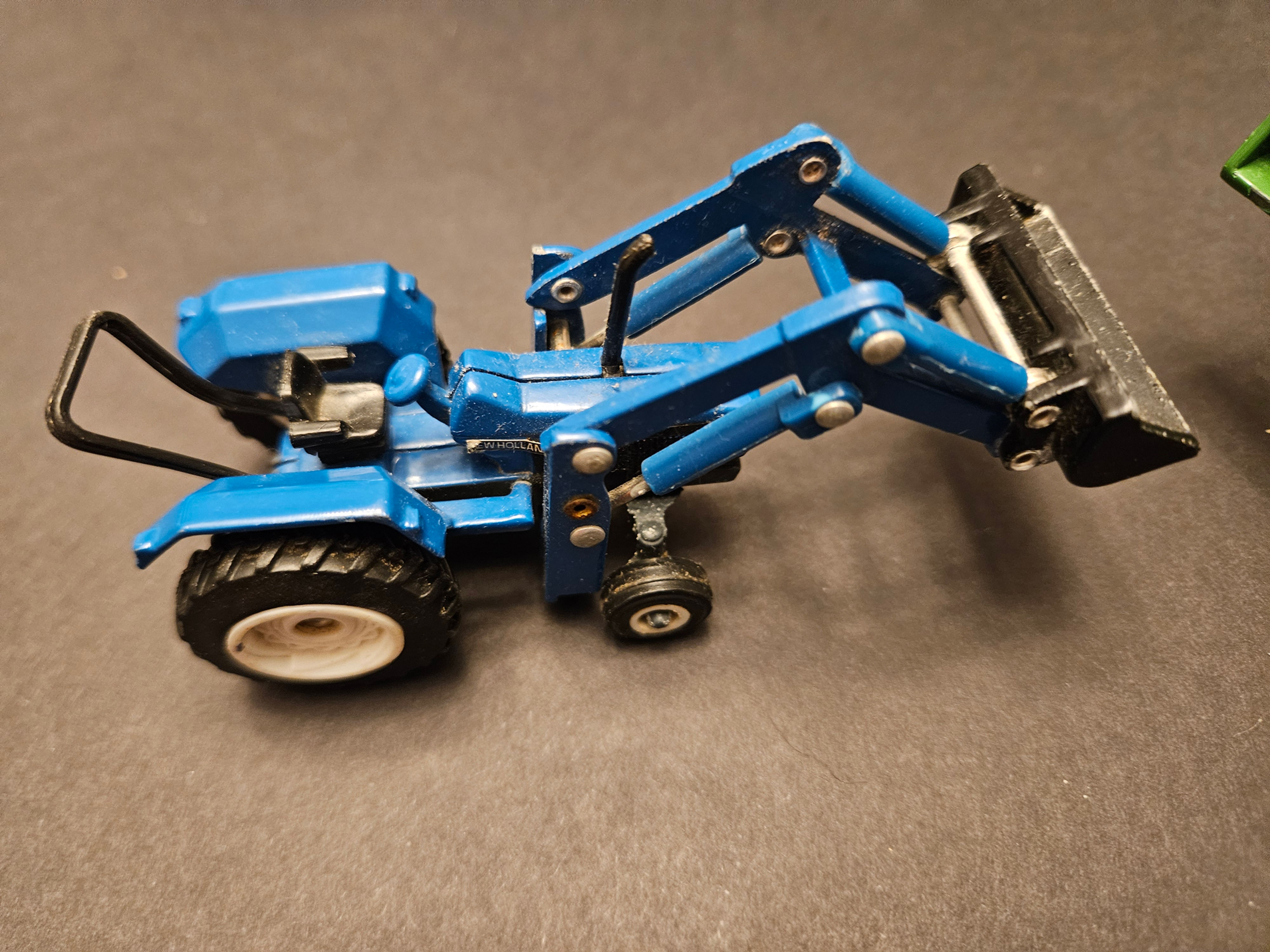 New Holland 7840 with Loader Blue Diecast Model Tractor Loose.