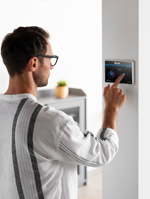 man-using-tablet-his-smart-home.jpg
