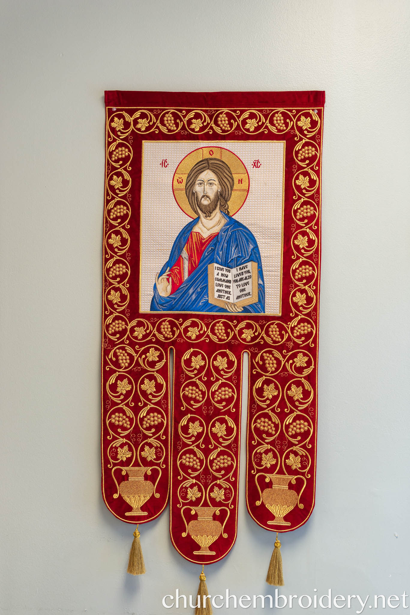 Eastern Orthodox church banner with embroidered icon of Jesus Christ