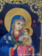 Detailed embroidery of the Theotokos and Christ Child on dark blue velvet banner with golden thread