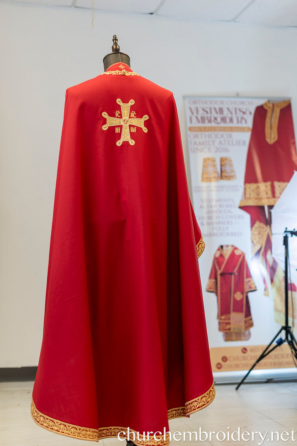 Thumbnail: Orthodox phelonion back view with embroidered gold cross on red liturgical vestment