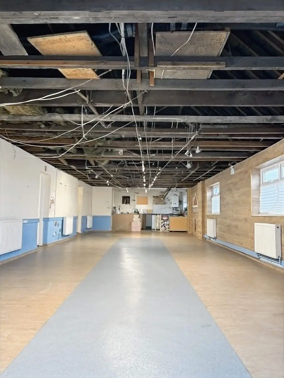 Safe removal of textured coating to church hall