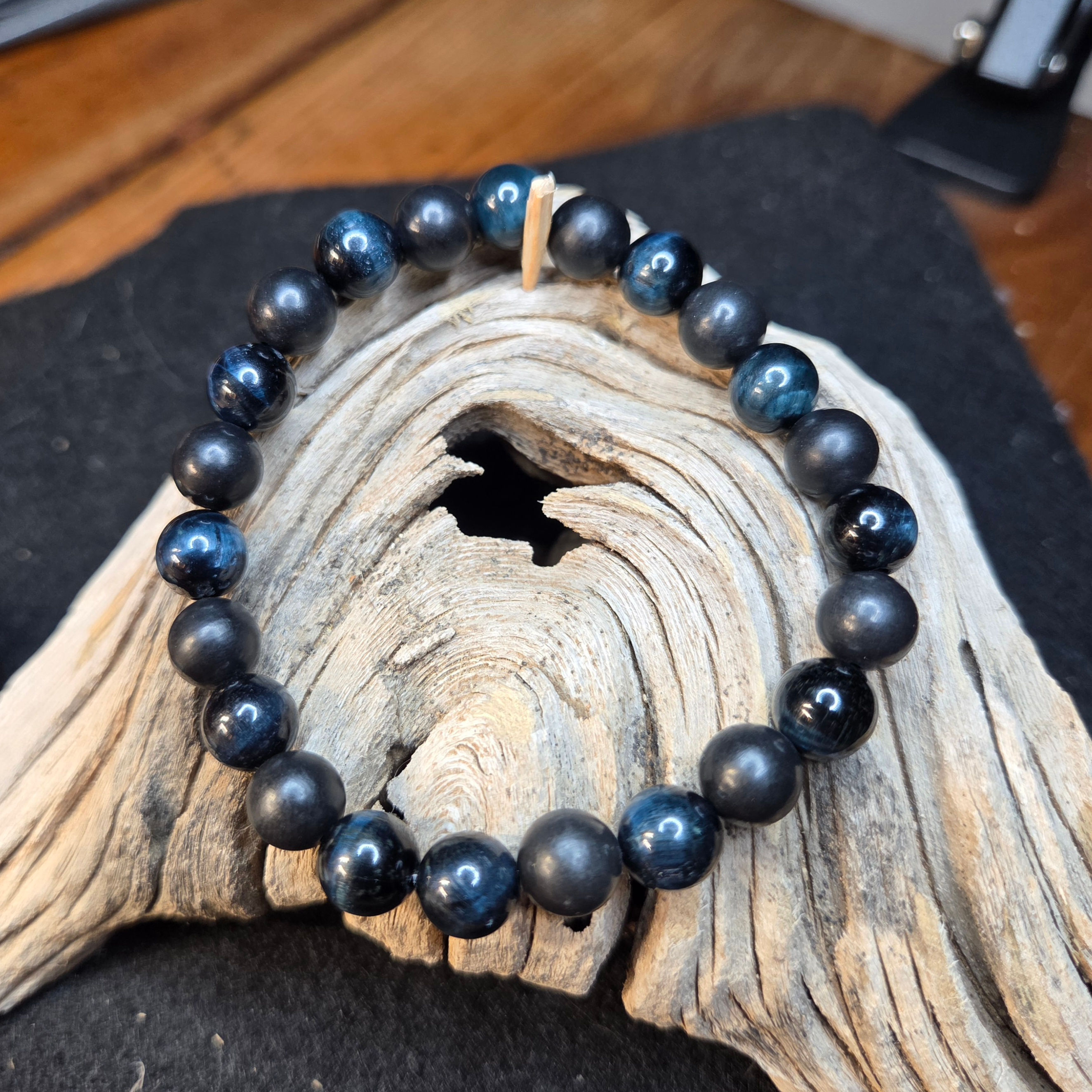 Shungite paired with Blue Tiger Eye