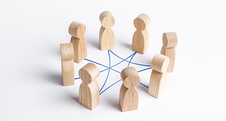 Circle of people interconnected by curve