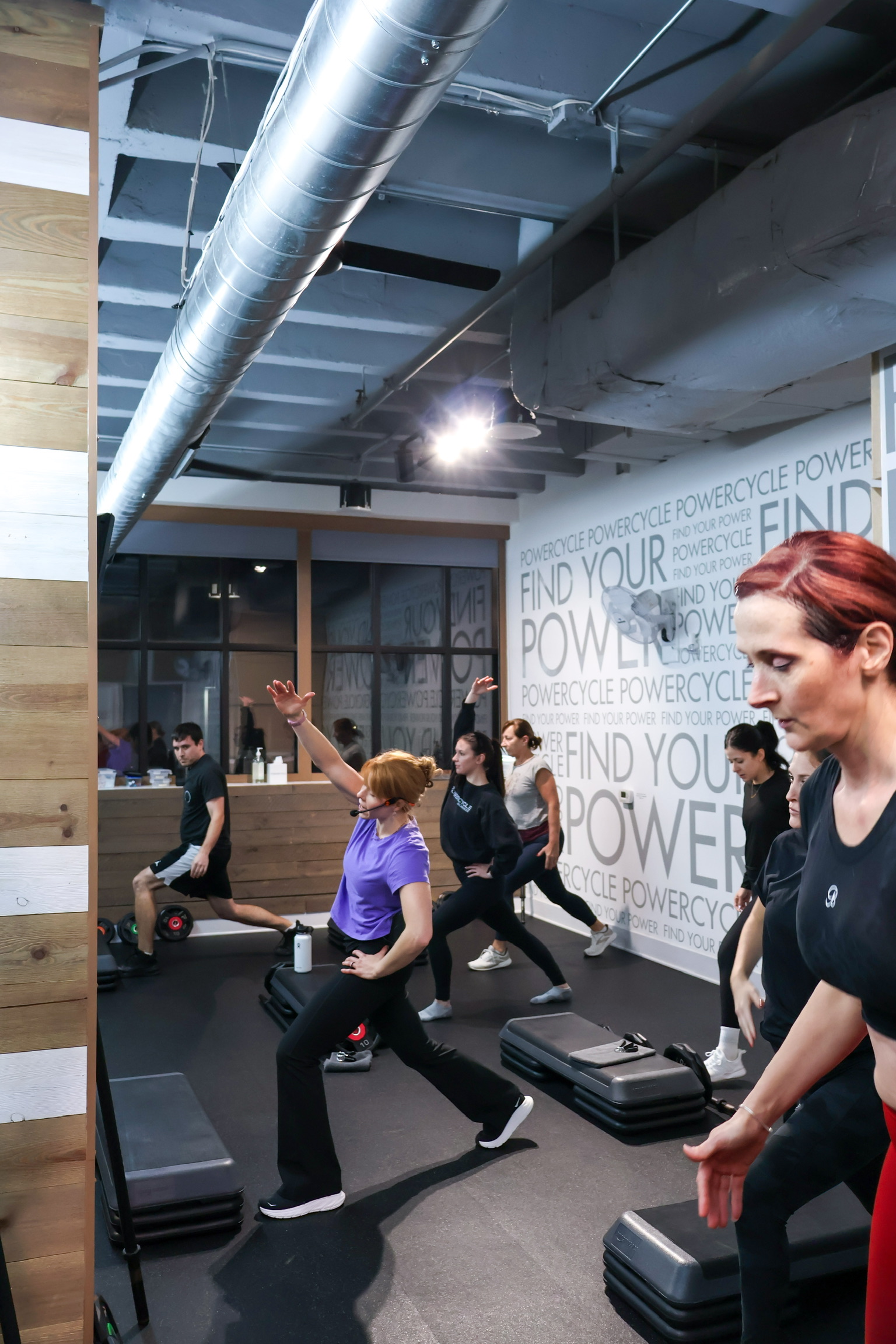 PowerCycle strength class working through coach-led total-body training