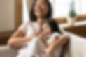 Lively asian young mother tickling little daughter enjoy free time active weekend together