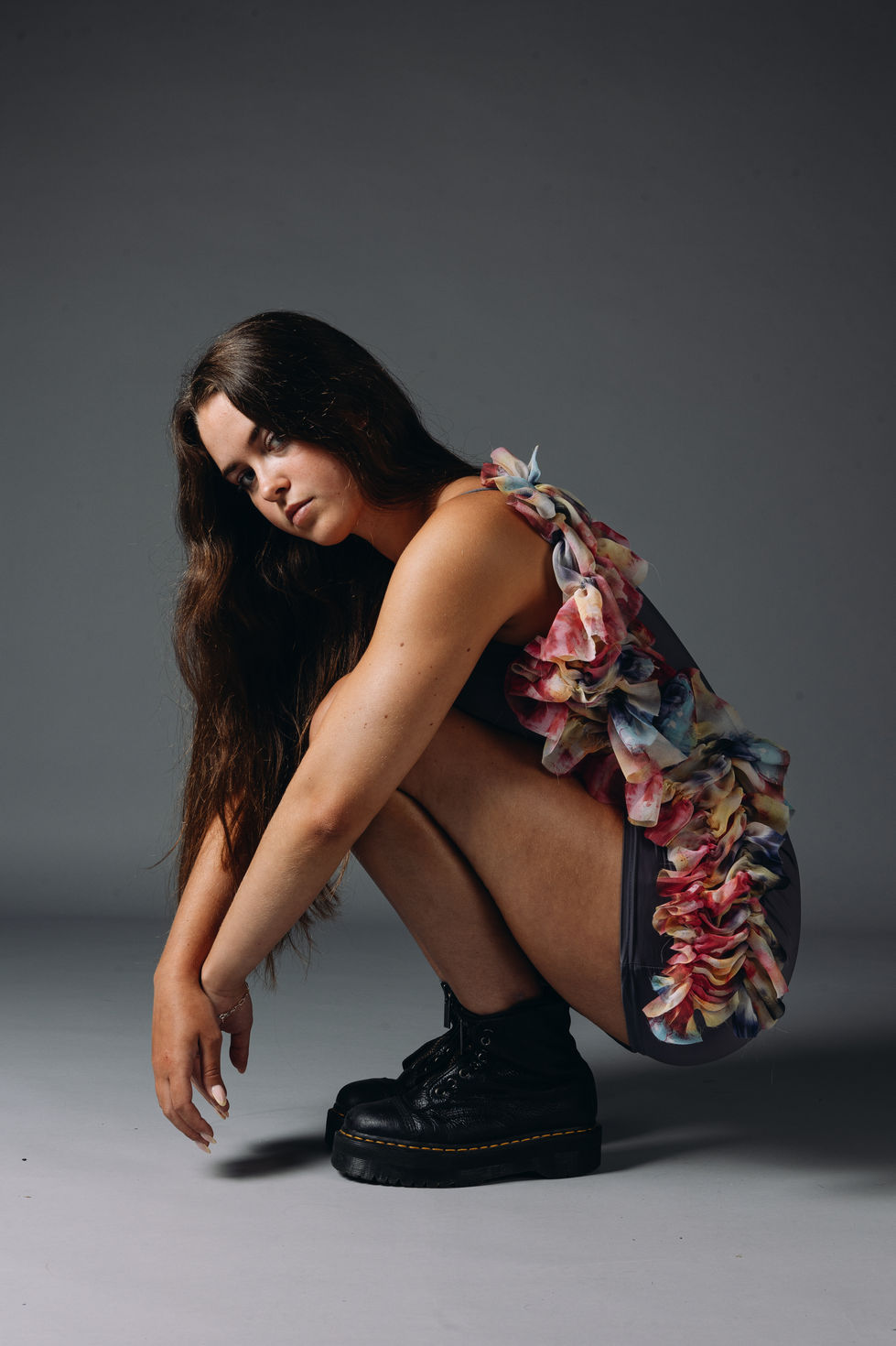 Smocked printed georgette along the side of a dress.
