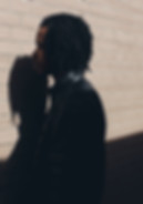 Man Against Brick Wall