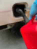 Paid Gas Delivery by Georgia Roadside Service Technician Closeup
