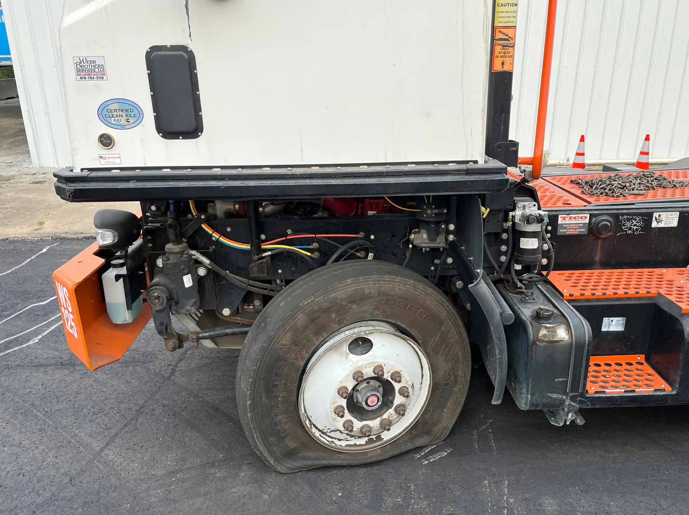 Flat tire on commercial truck.