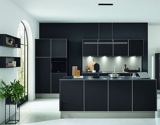 Elegant kitchen in Oxfordshire designed by Liquid Space Design, featuring bespoke wood kitchens and German design kitchens