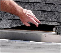 Checking the drip flashing and number of layers of shingles, etc.