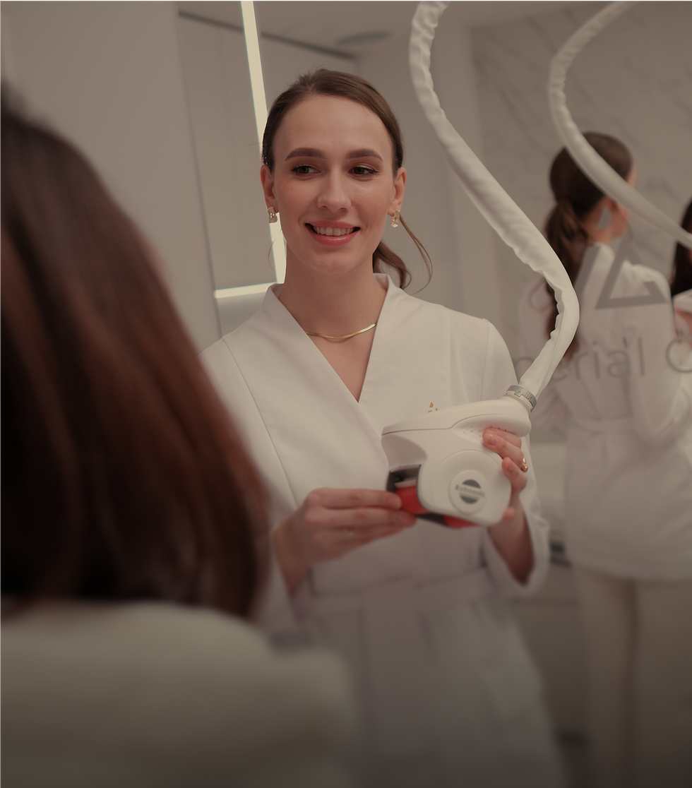 Understanding - Aesthetic specialist at Imperial Clinic explaining a laser treatment device to a patient