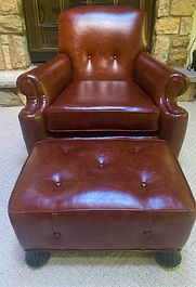 reupholstered leather chair and ottoman