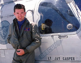 Jay Casper as a U.S. Navy Lieutenant beside his SH-60 rescue helicopter with his name sten