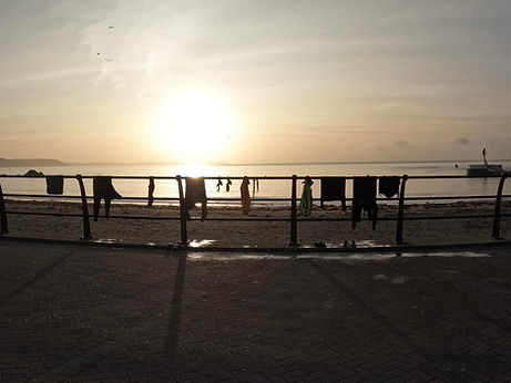wetsuit drying sunset.jpg