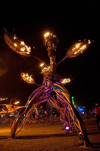fire sculpture installation by flaming lotus at burning man