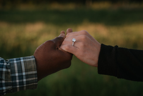 engagement ring in the hand of a newlywed couple