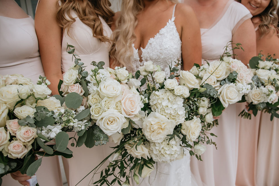 bridal bouquets from local harvard florist during wedding portraits