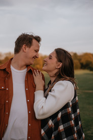 all smiles during an engagement session at busse woods schaumburg illinois
