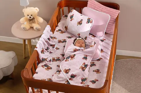 produção fotográfica de enxoval infantil para indústria têxtil por M2 Imagens