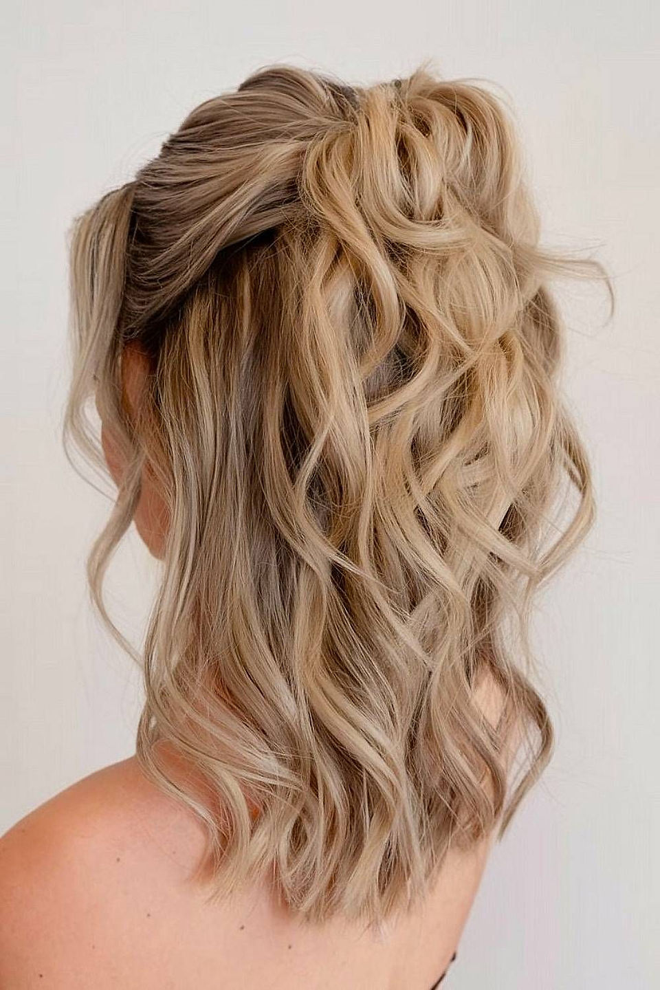 Bride with half up, half down hairstyle