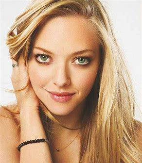 golden blonde  hair with green eyes