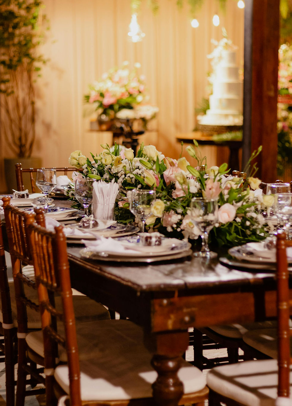 Elegant Table setup with floral centerpiece and fine dinnerware