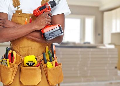 Contractor holding his power tool