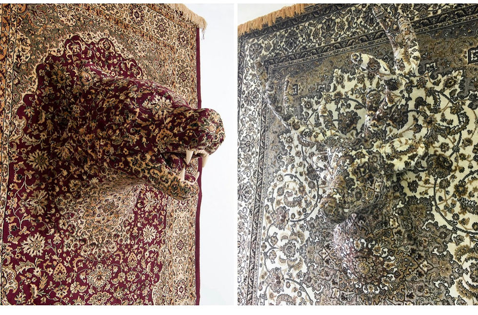 Side angle of two 3D Persian carpet sculptures. One of a bear and one of a moose head.