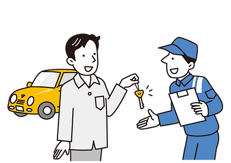整備士に車のキーを渡す男性