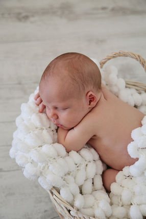 Newborn in Basket