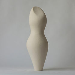 Closed ceramic sculpture featuring an asymmetrical curved form, photographed against a clean white background.